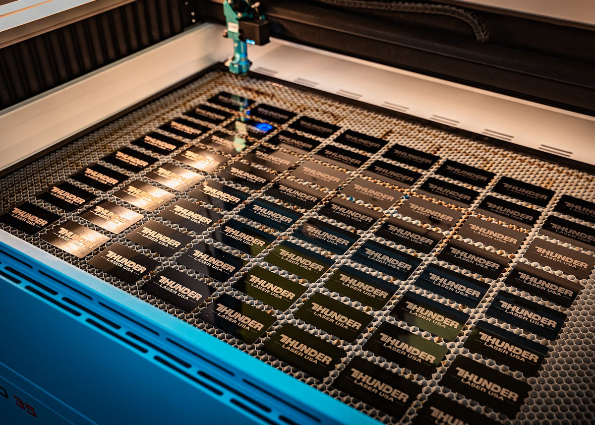 A full bed of engraved Thunder Laser cards